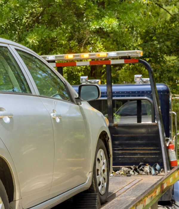 Car service transportation of non working car on tow truck